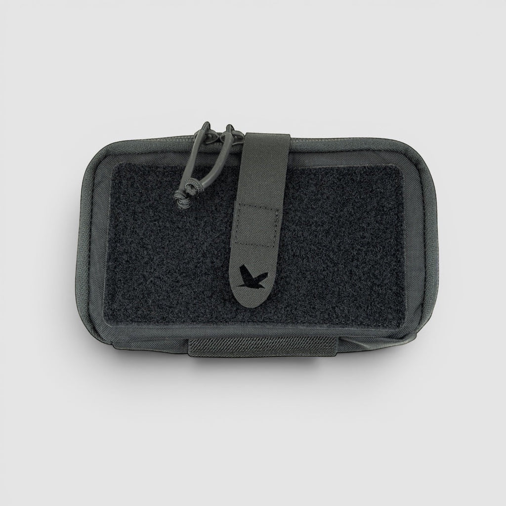 Night Heron Israel Alpha Admin Pouch, a dark grey tactical pouch with MOLLE compatibility and Velcro panel.
