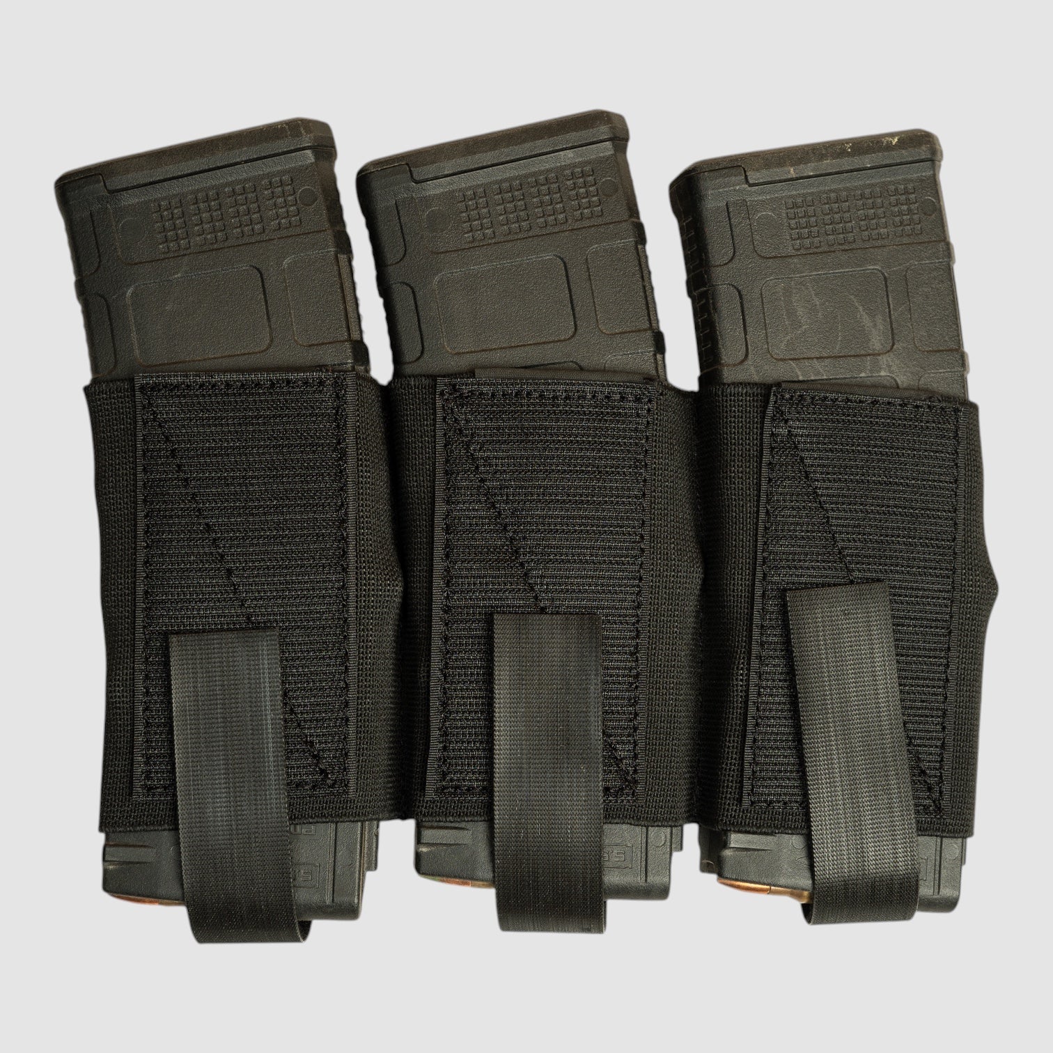 Night Heron Israel elastic triple magazine insert holding three 5.56 magazines with adjustable Velcro height straps.