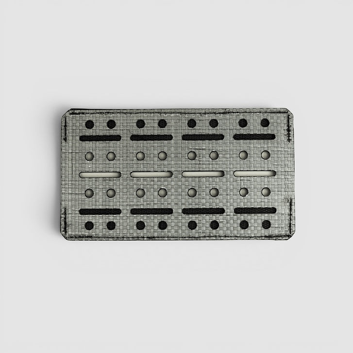 Night Heron Israel modular organizer made of Tegris composite with adjustable shock cords and Velcro for tactical gear.