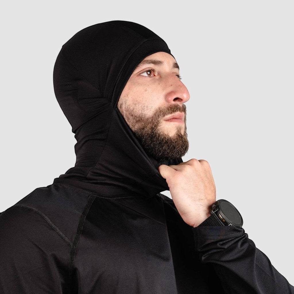 Night Heron Israel black polyester-elastane balaclava with extended collar for full neck coverage and flat seams for helmet compatibility.