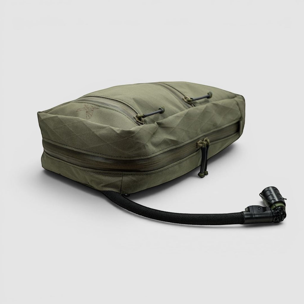 Night Heron Israel olive green X-Ray Large GP Pouch made of Cordura and X-Pac, with multiple zippered compartments and a hydration tube.
